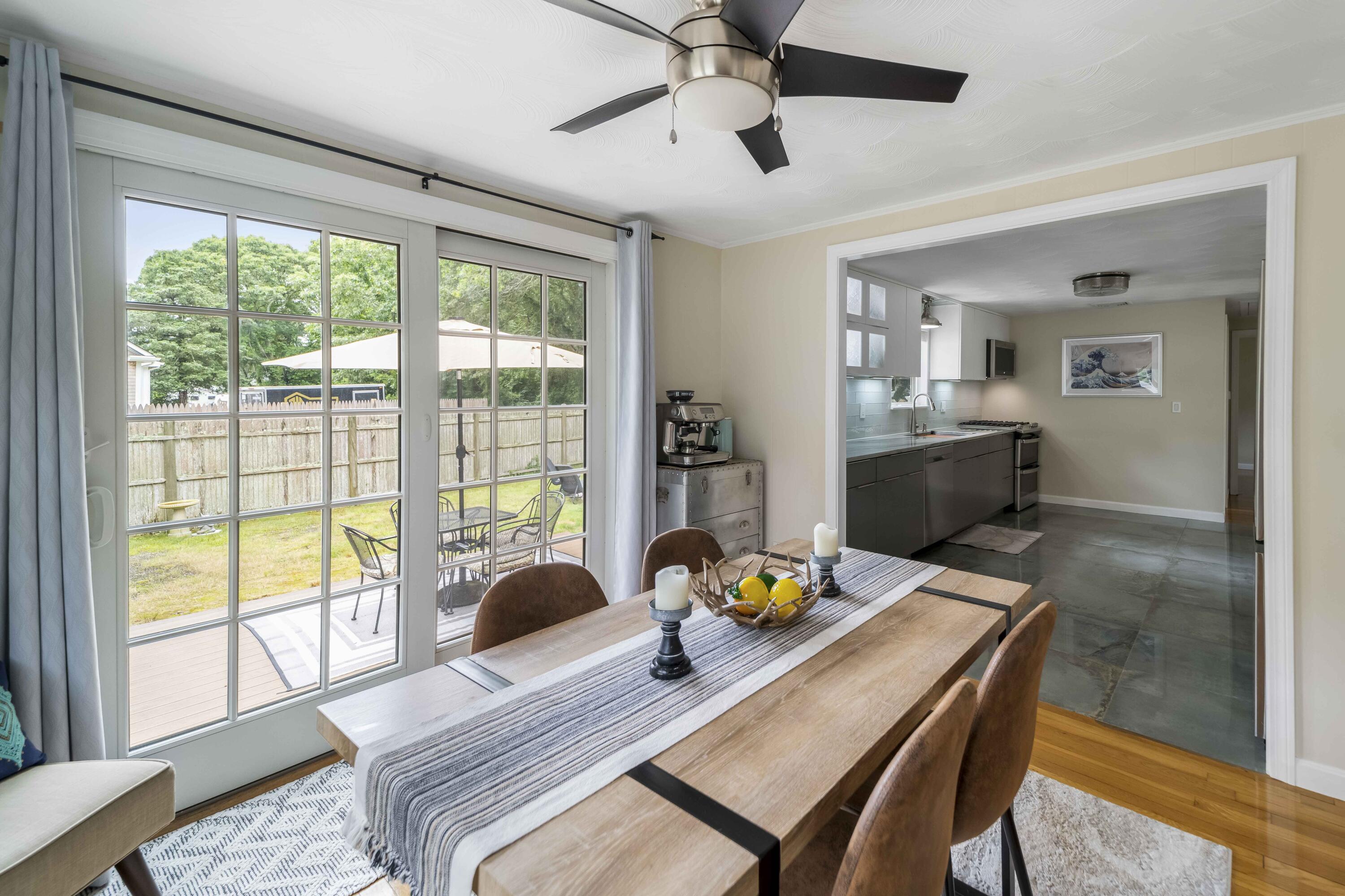 7 Arbeta Road Hyannis, MA 02601 - Photo 17 of 54 a view of a dining room with furniture and a window