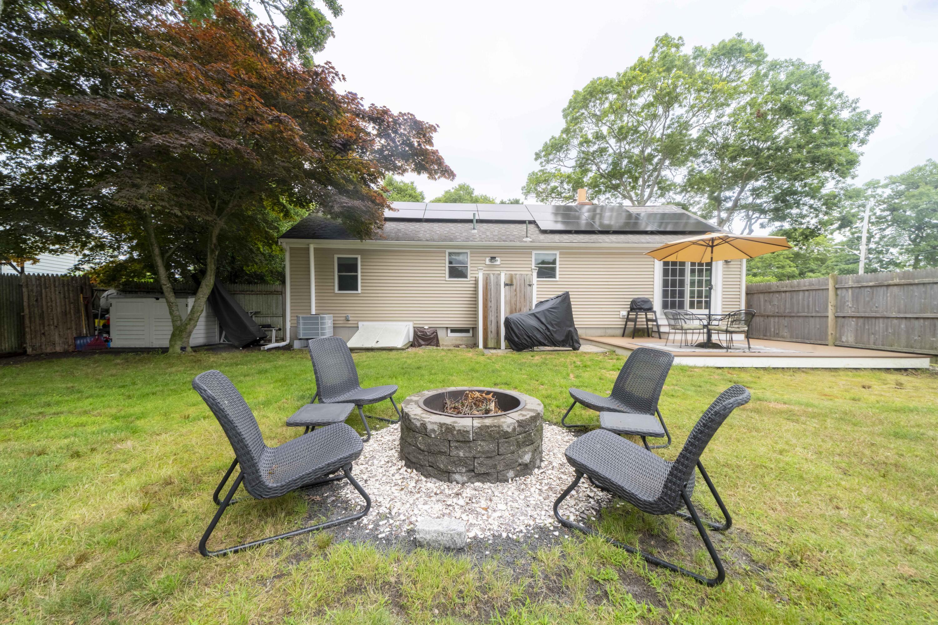 7 Arbeta Road Hyannis, MA 02601 - Photo 44 of 54 a swimming pool with outdoor seating and yard