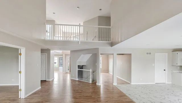 a view of entryway with wooden floor