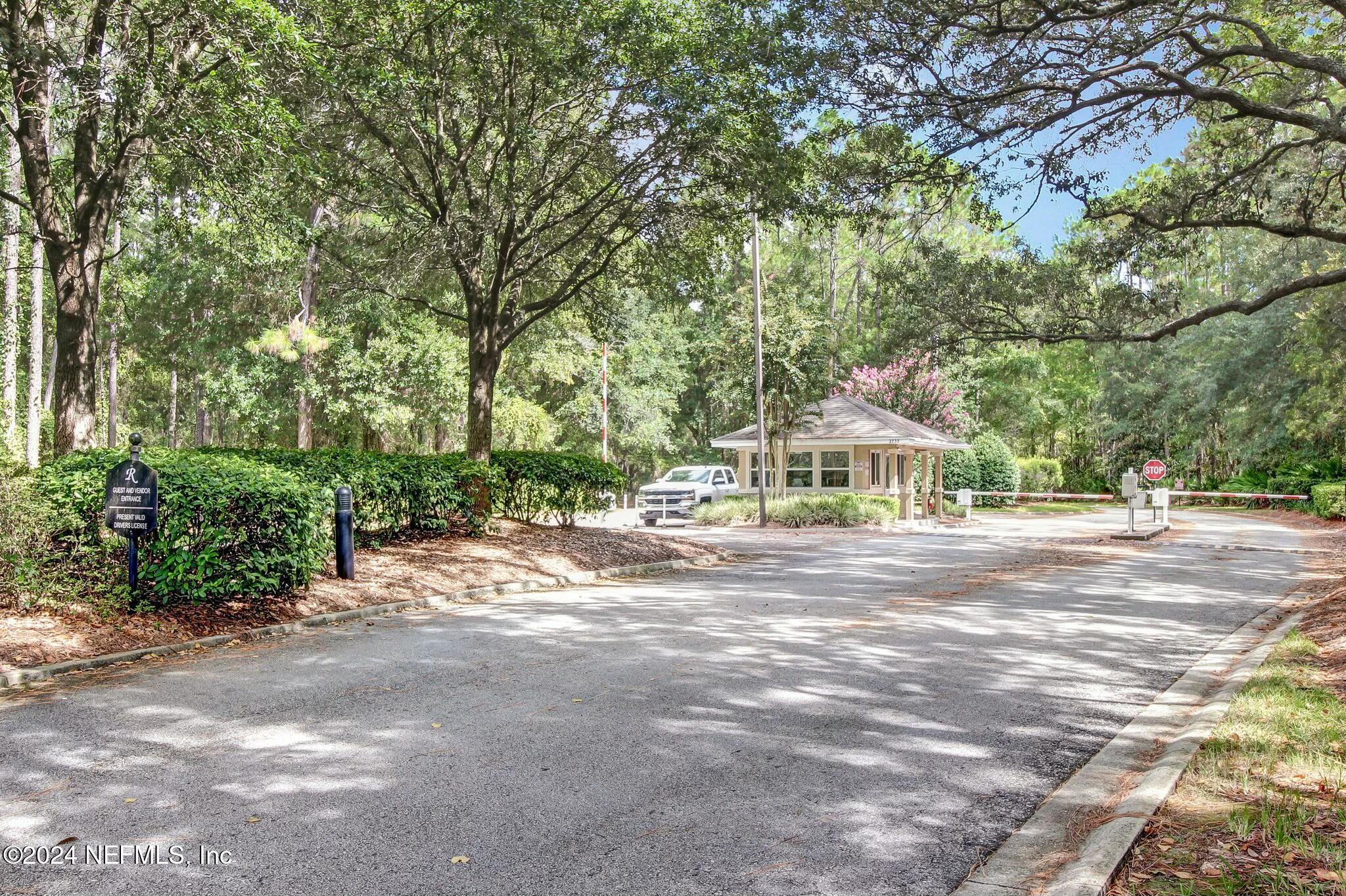 3165 Ravines Road, Unit 3601 Middleburg, FL 32068 - Photo 5 of 23 a view of a house with a yard and large trees