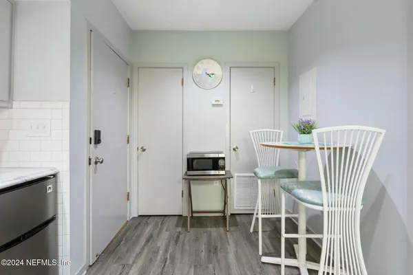 a view of dining room with wooden floor