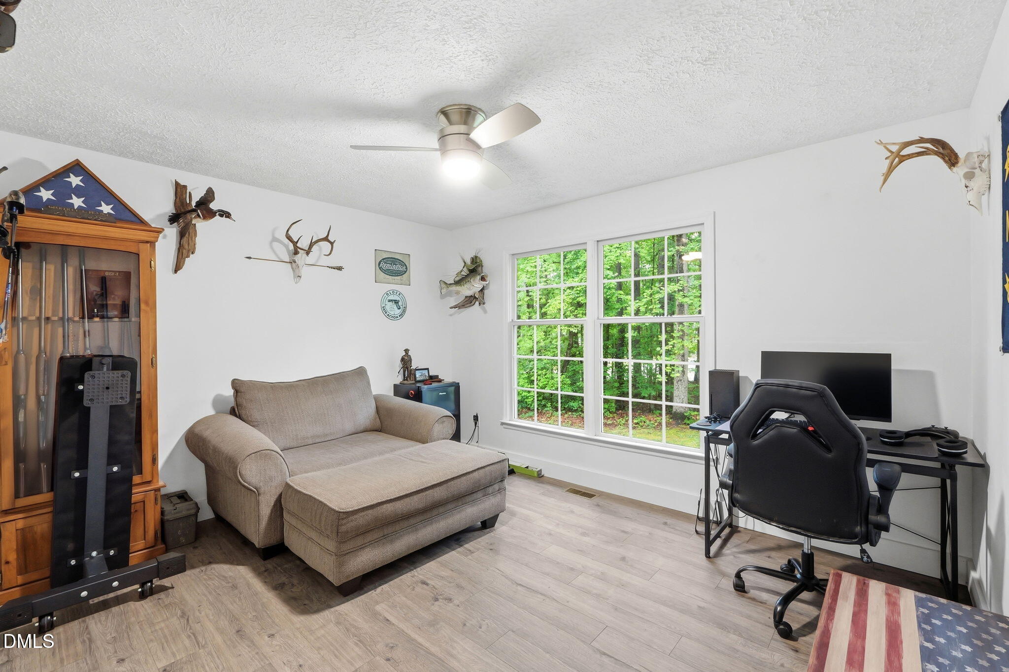 1925 Old Allensville Road Roxboro, NC 27574 - Photo 28 of 58 a living room with furniture and a wooden floor
