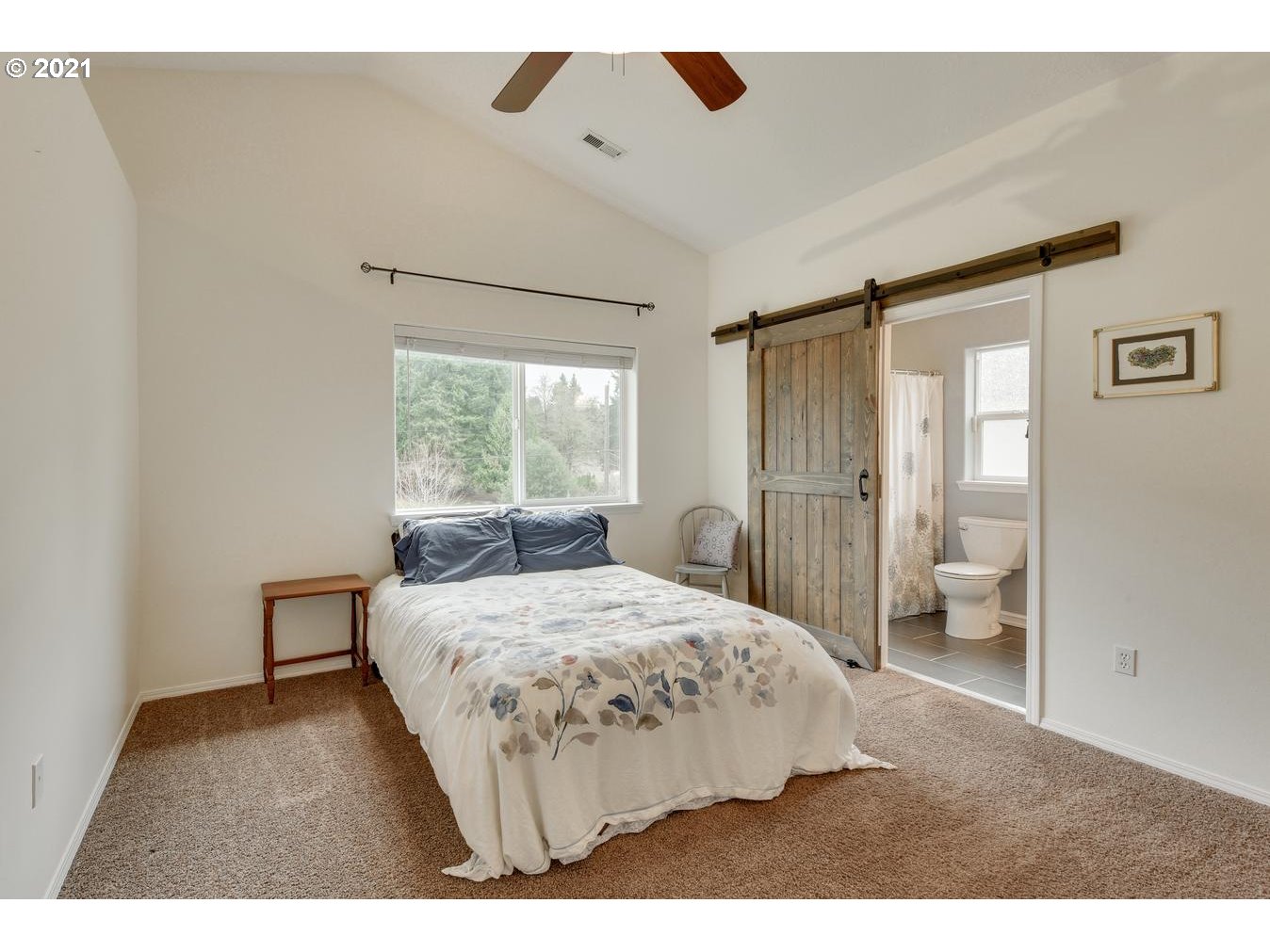 39392 Amherst Street Sandy, OR 97055 - Photo 14 of 30 a bedroom with a bed and a large window