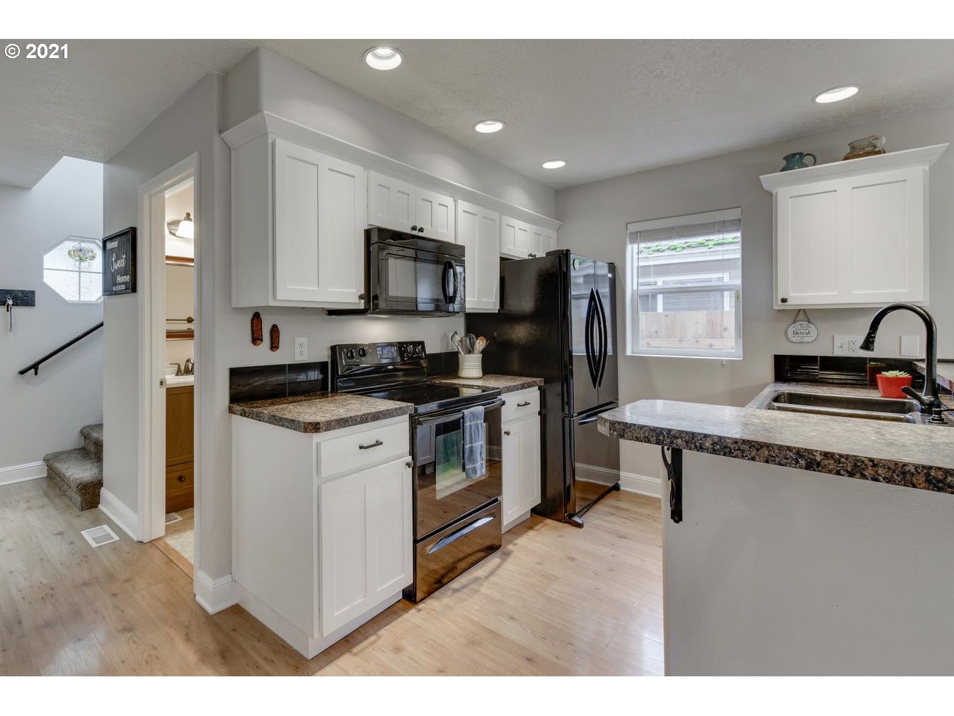 39392 Amherst Street Sandy, OR 97055 - Photo 8 of 30 a kitchen with a sink cabinets and appliances