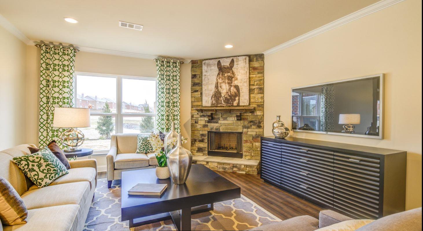 1097 Brixworth Drive Spring Hill, TN 37174 - Photo 14 of 20 View of our most popular, and constant talking piece, stack stone fireplace!