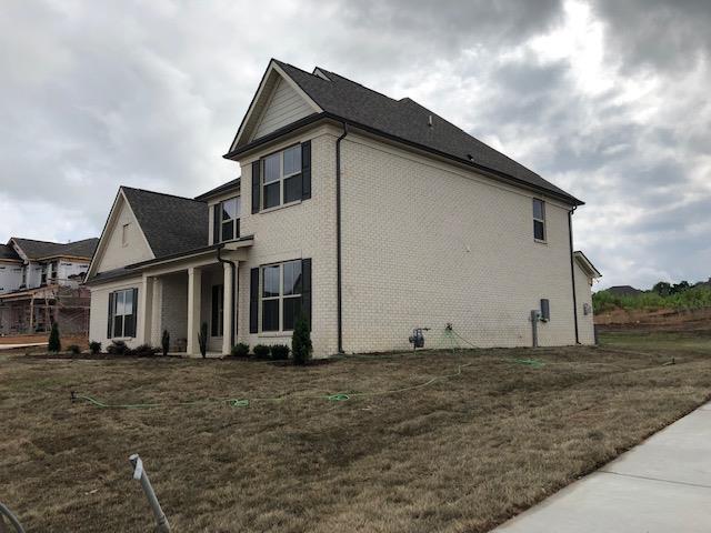 1097 Brixworth Drive Spring Hill, TN 37174 - Photo 4 of 20 Side view of our brand new exterior in our reserve phase!