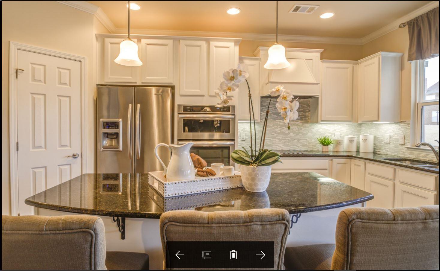 1097 Brixworth Drive Spring Hill, TN 37174 - Photo 10 of 20 Eat-In island, opening to a view of kitchen!