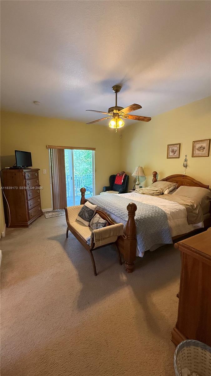 232 Southeast 32nd Terrace Homestead, FL 33033 - Photo 5 of 11 a bedroom with bed and window
