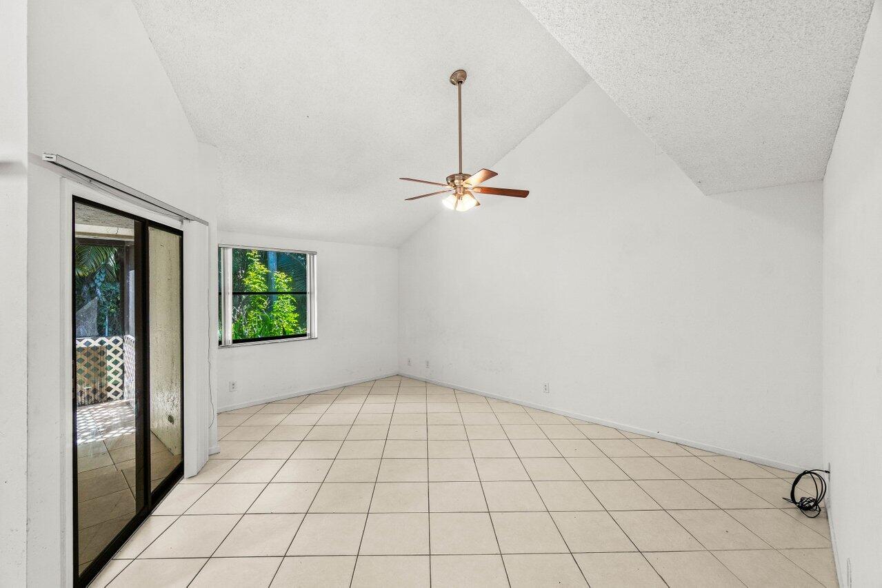 9308 Ketay Circle Boca Raton, FL 33428 - Photo 14 of 35 a view of an empty room and window