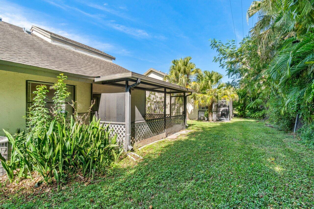 9308 Ketay Circle Boca Raton, FL 33428 - Photo 35 of 35 a view of a house with a yard