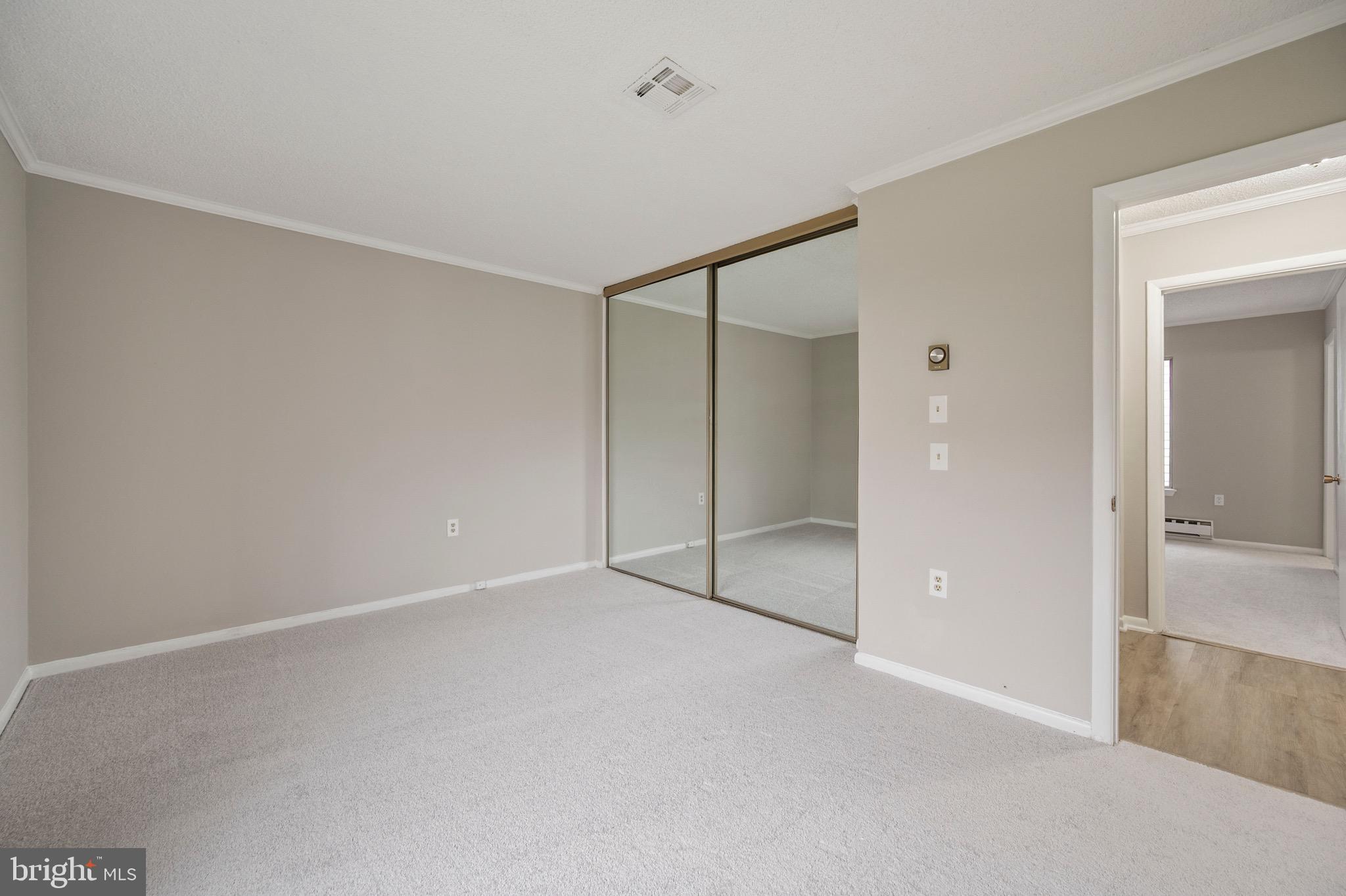 15561 Prince Frederick Way, Unit 114A Silver Spring, MD 20906 - Photo 23 of 32 a view of an empty room