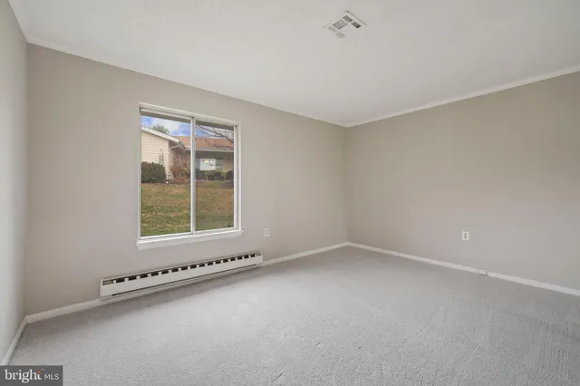 a view of an empty room with window