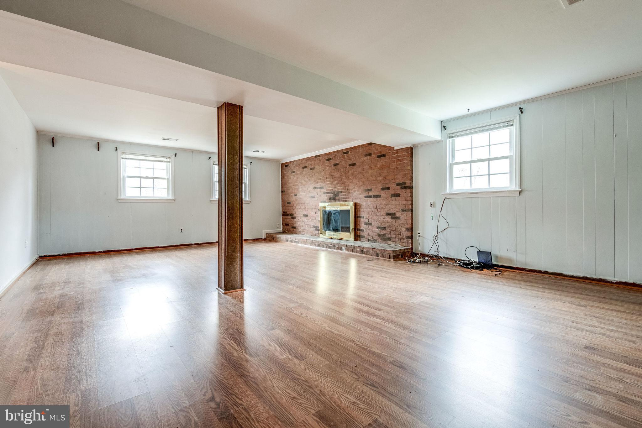 7723 Hayfield Road Alexandria, VA 22315 - Photo 16 of 28 Large lower level family room