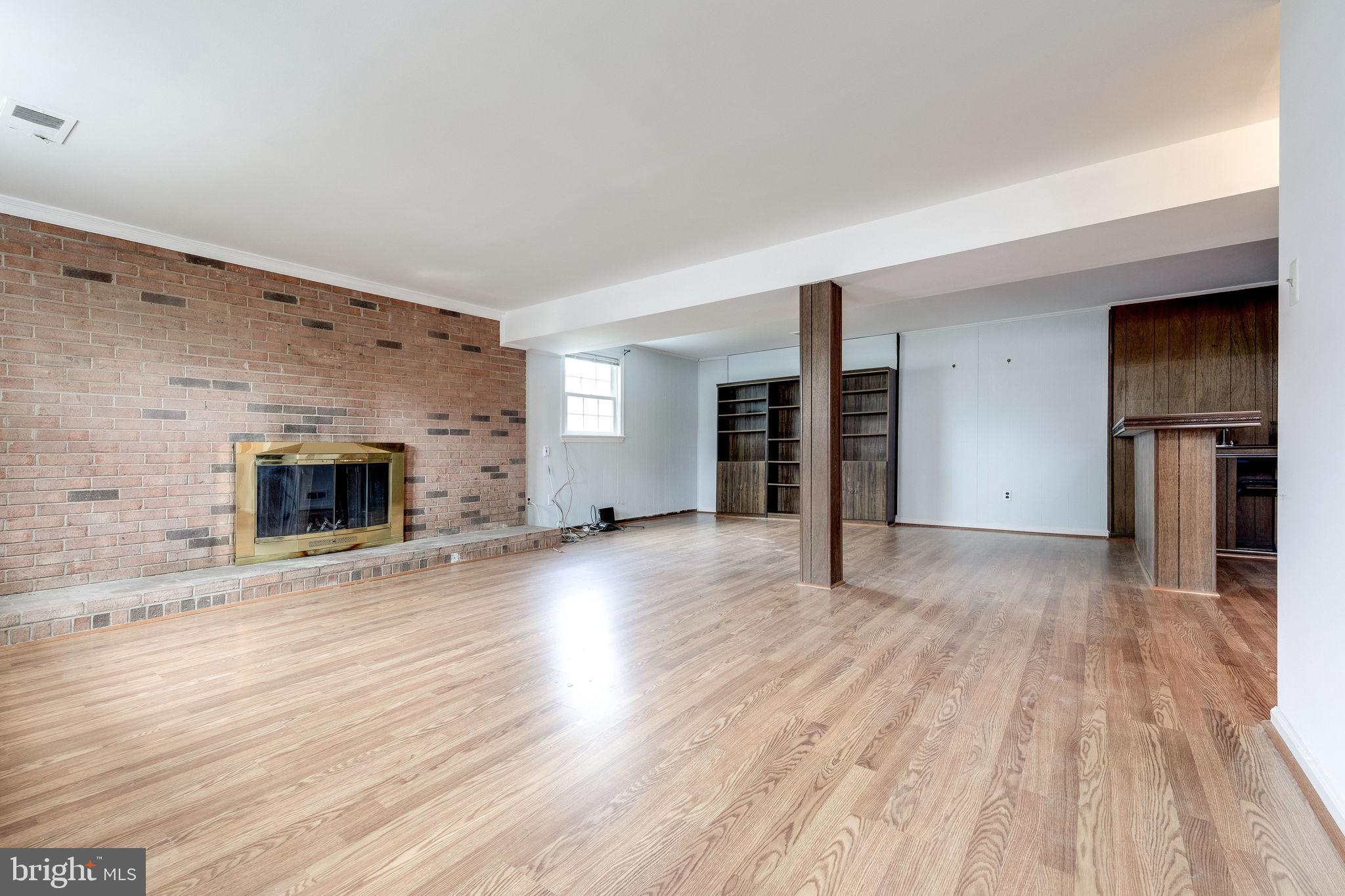 7723 Hayfield Road Alexandria, VA 22315 - Photo 17 of 28 Cozy wood burning fieplace
