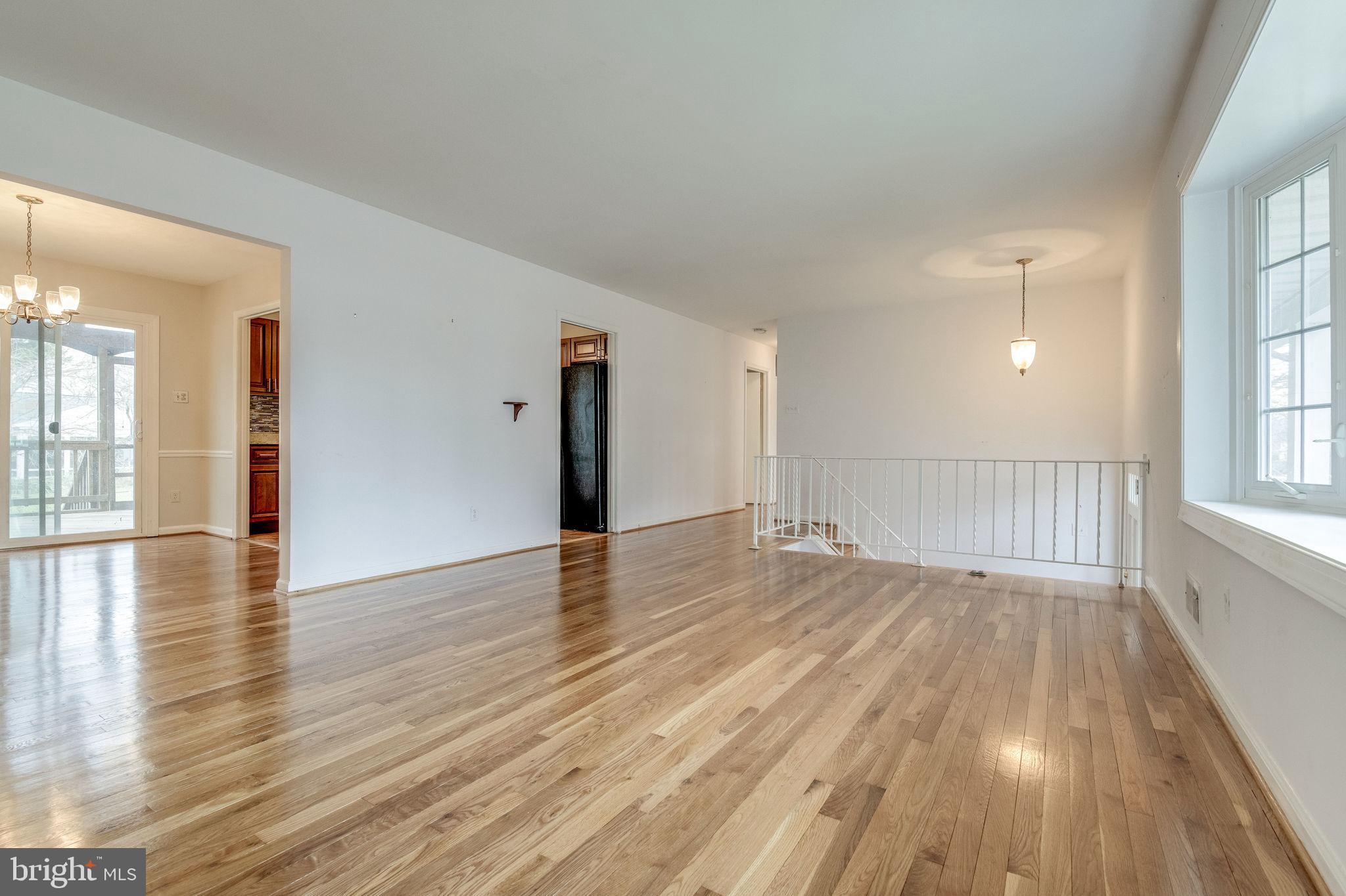 7723 Hayfield Road Alexandria, VA 22315 - Photo 6 of 28 Recently refinished hardwood floors