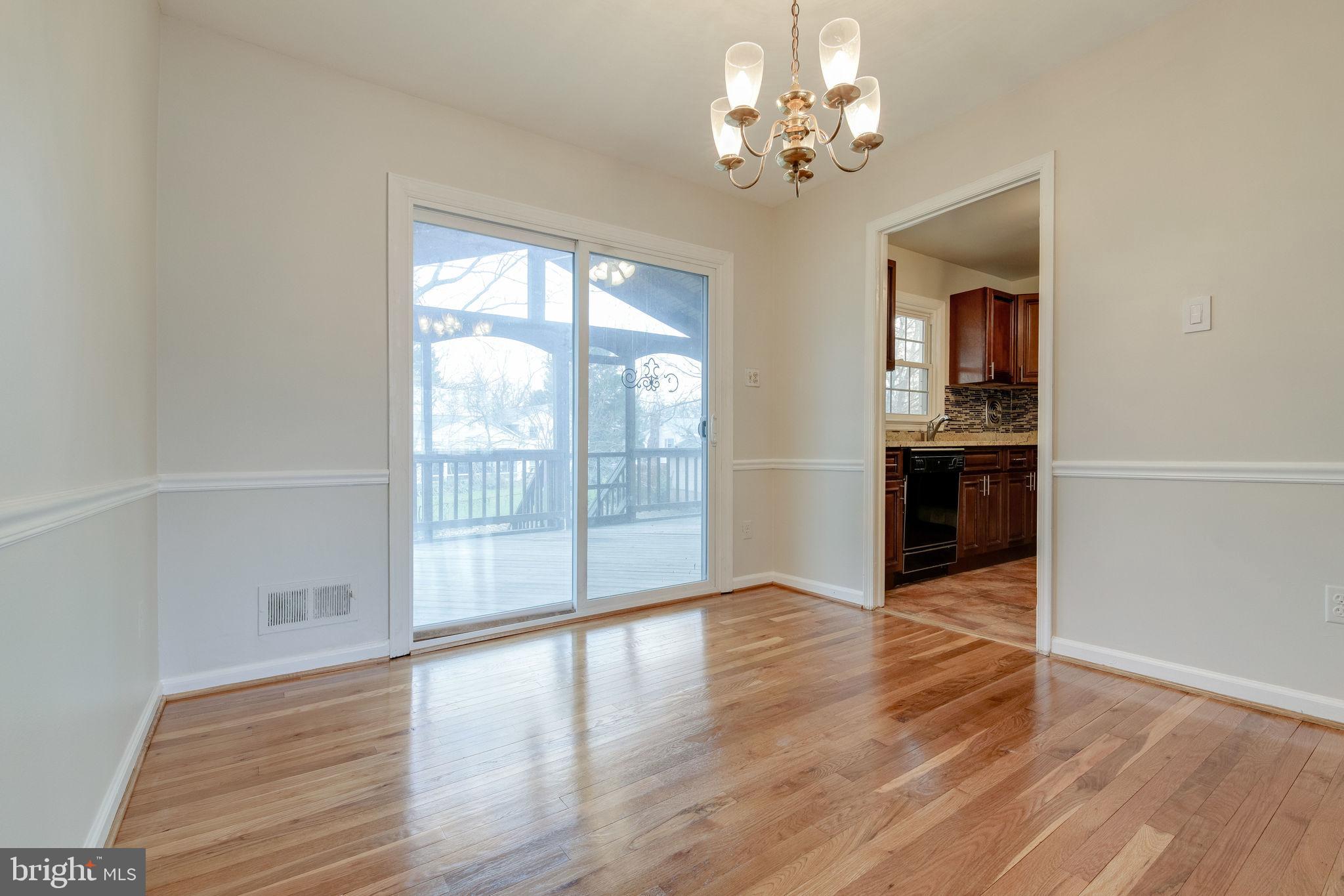7723 Hayfield Road Alexandria, VA 22315 - Photo 8 of 28 Screened in porch off of dining room!