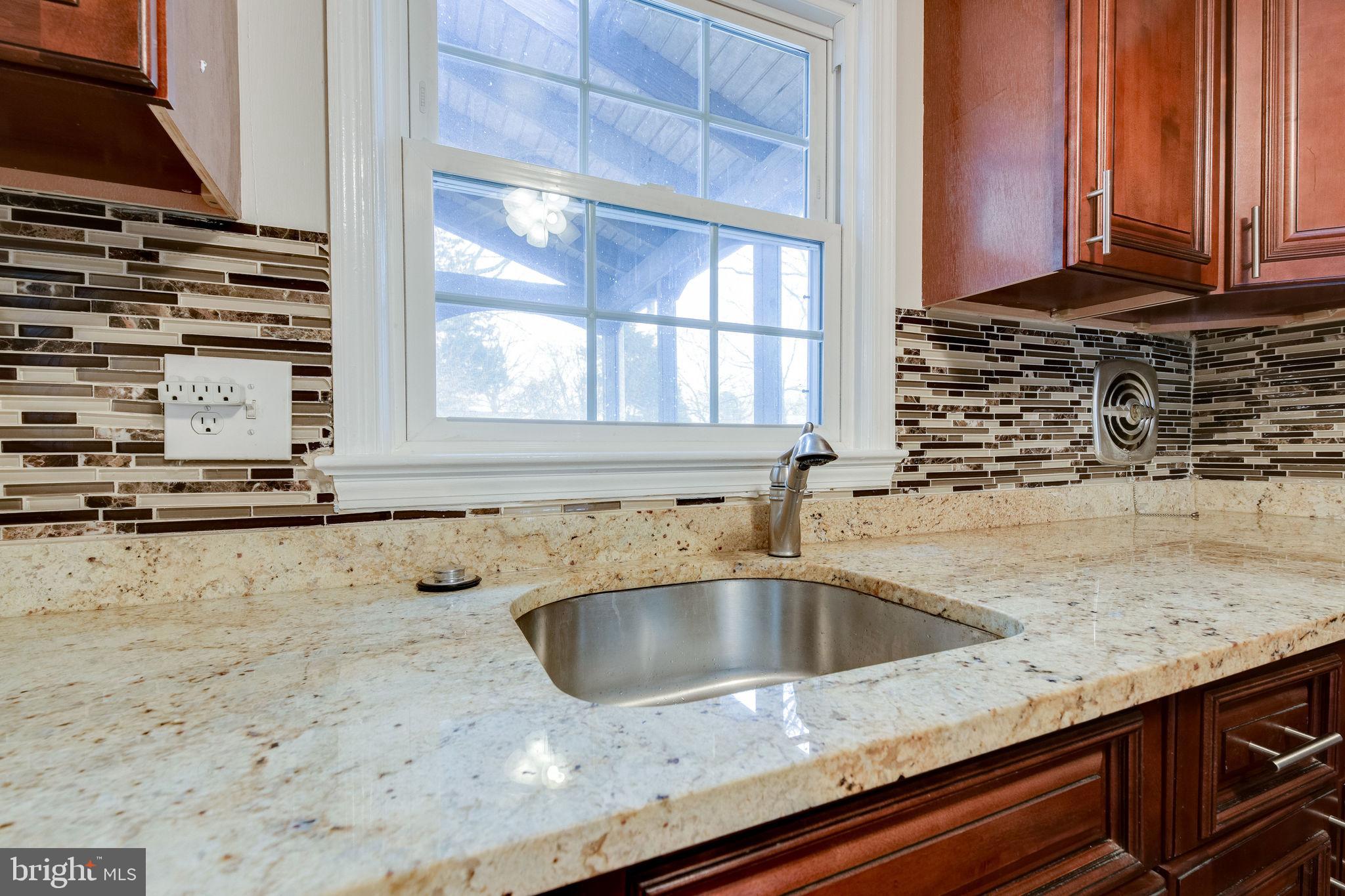 7723 Hayfield Road Alexandria, VA 22315 - Photo 10 of 28 Beautiful tile backsplash