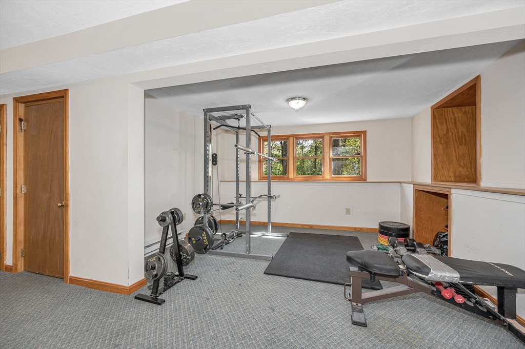 38 Pine Ridge Drive Ayer, MA 01432 - Photo 27 of 42 a view of a room with gym equipment