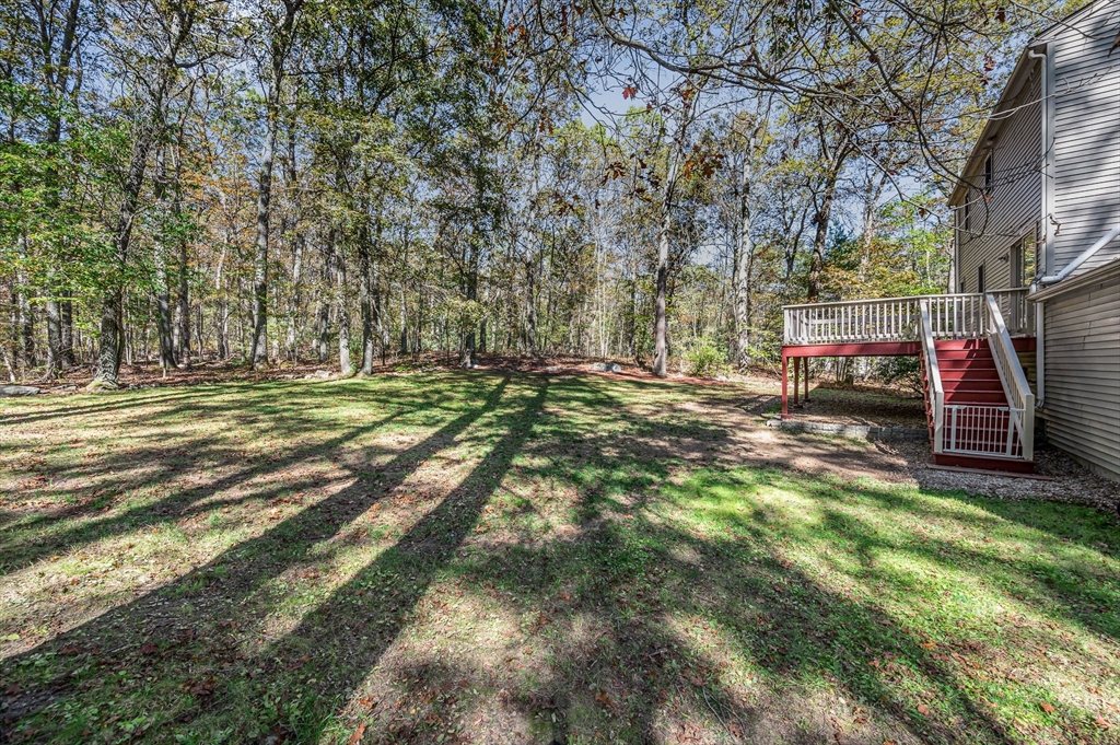 38 Pine Ridge Drive Ayer, MA 01432 - Photo 31 of 42 a view of outdoor space with playground and green space