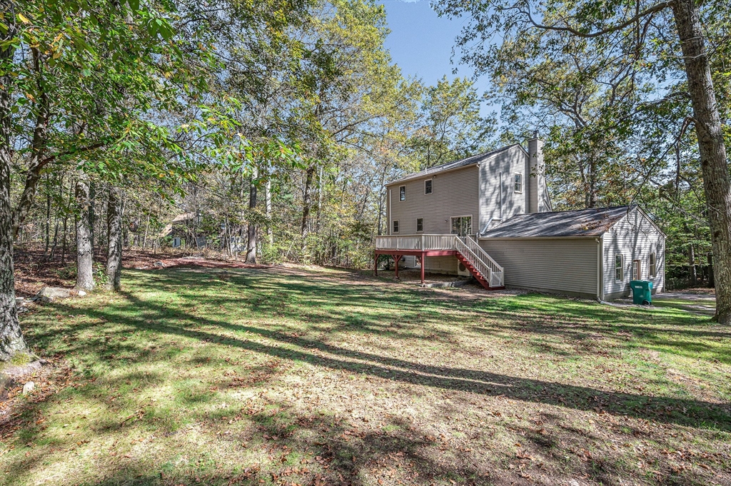 38 Pine Ridge Drive Ayer, MA 01432 - Photo 34 of 42 a house view with a sitting space and garden space