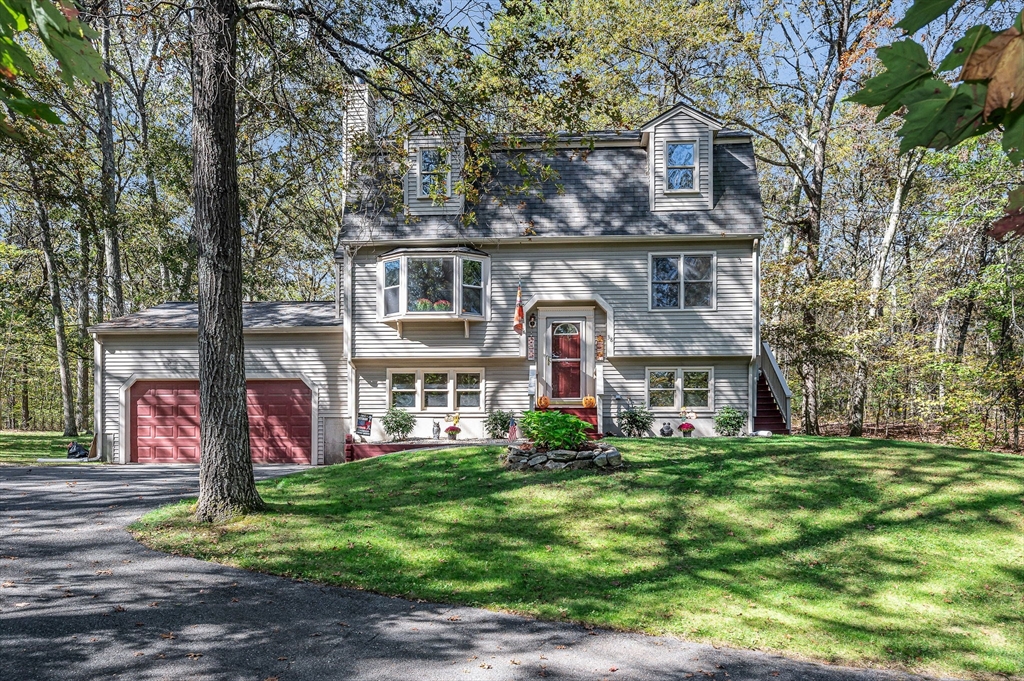 38 Pine Ridge Drive Ayer, MA 01432 - Photo 36 of 42 a view of a house with a yard