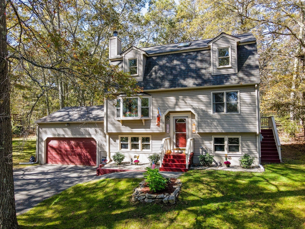 38 Pine Ridge Drive Ayer, MA 01432 - Photo 39 of 42 a front view of house with yard
