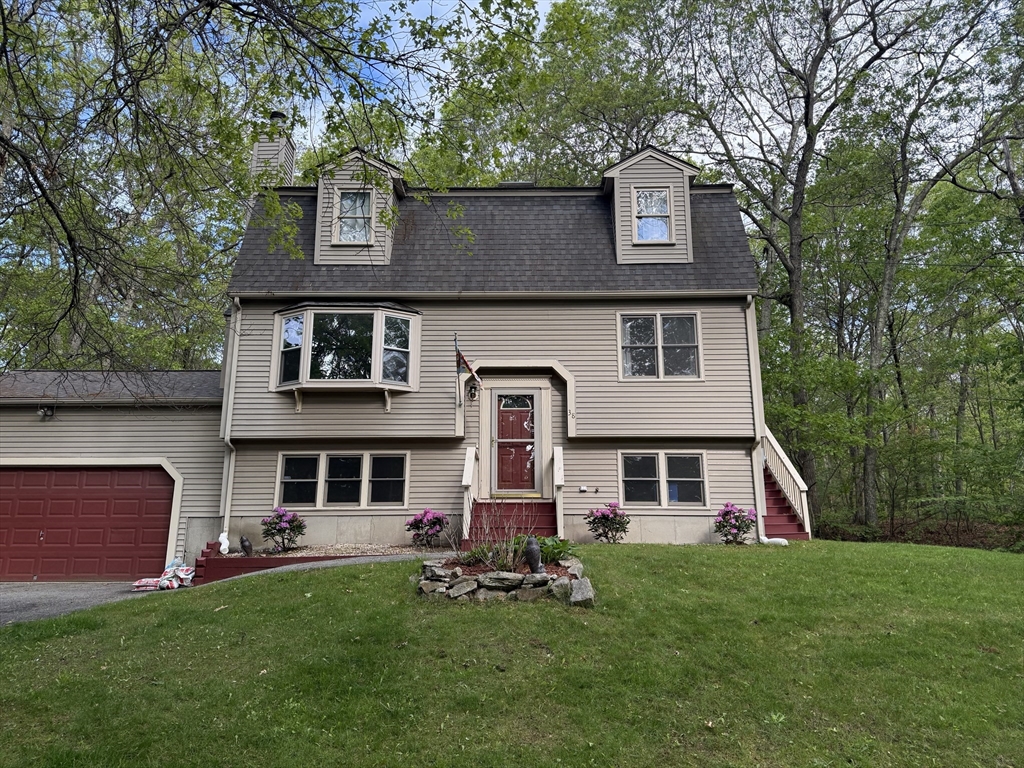 38 Pine Ridge Drive Ayer, MA 01432 - Photo 42 of 42 front view of a house with a yard