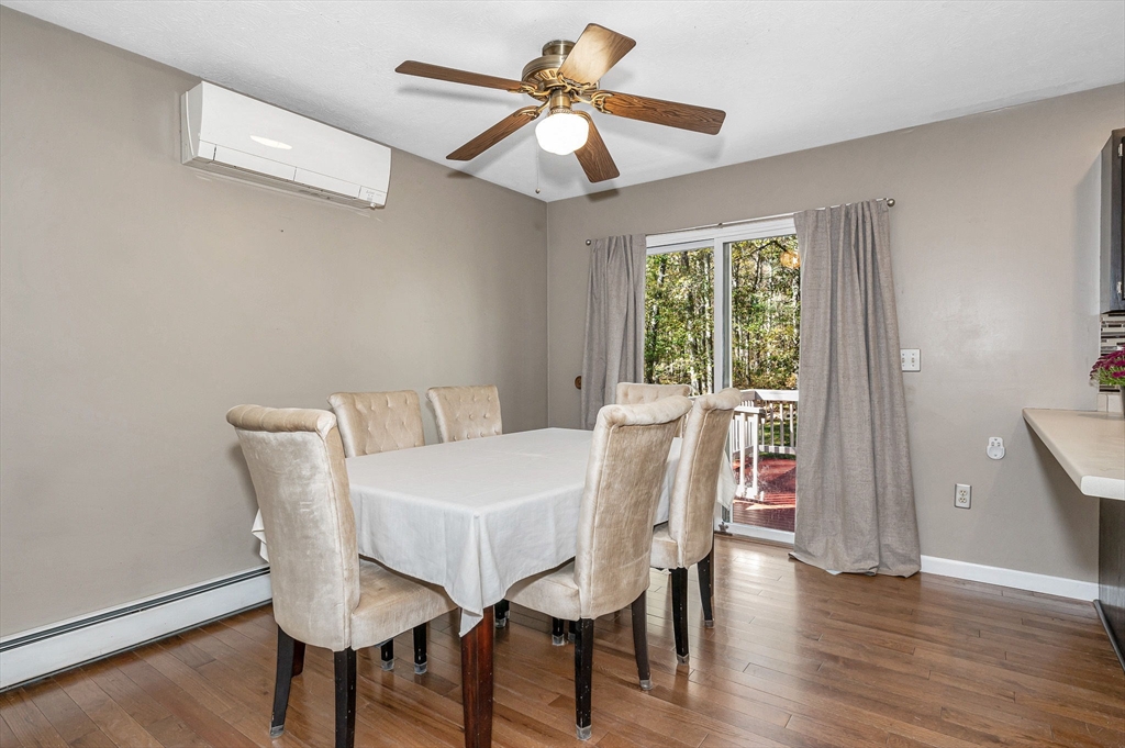38 Pine Ridge Drive Ayer, MA 01432 - Photo 6 of 42 a view of a dining room with furniture window and wooden floor
