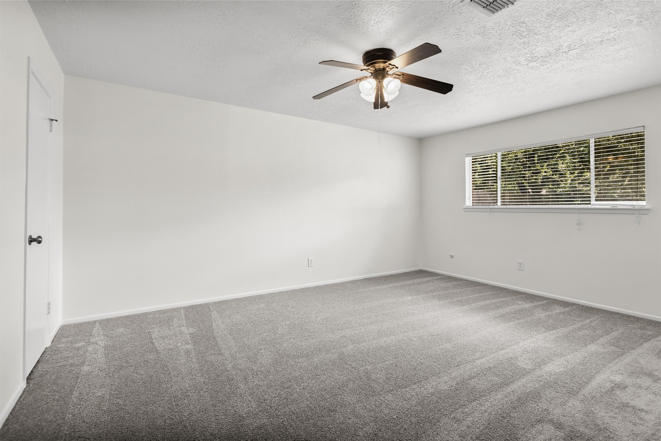 11319 Rousseau Drive Houston, TX 77065 - Photo 12 of 29 This is the very spacious primary bedroom.