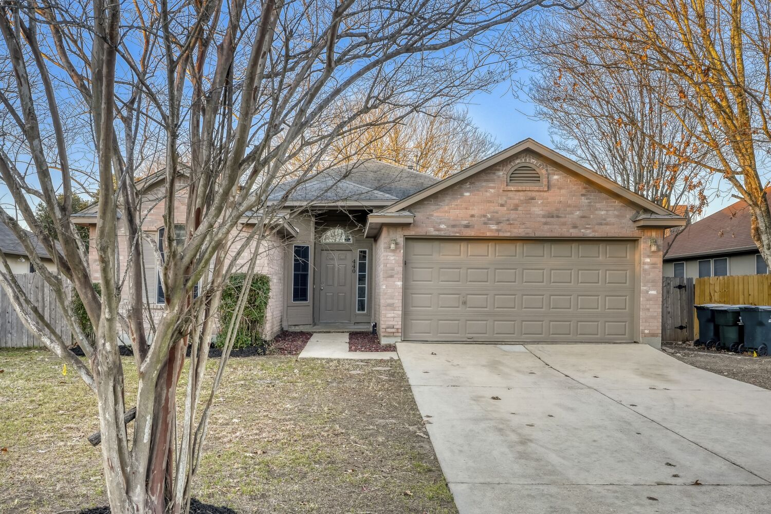 440 Zebra Drive Kyle, TX 78640 - Photo 1 of 1 front view of a house with a yard