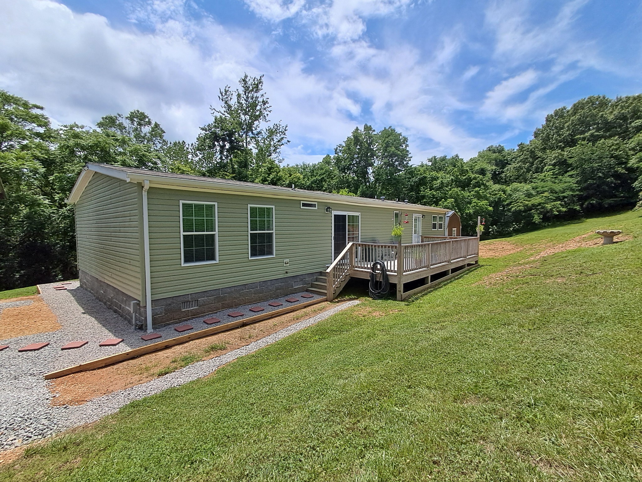 5525 Wiley Hollow Road Culleoka, TN 38451 - Photo 8 of 64 a view of a house with a backyard