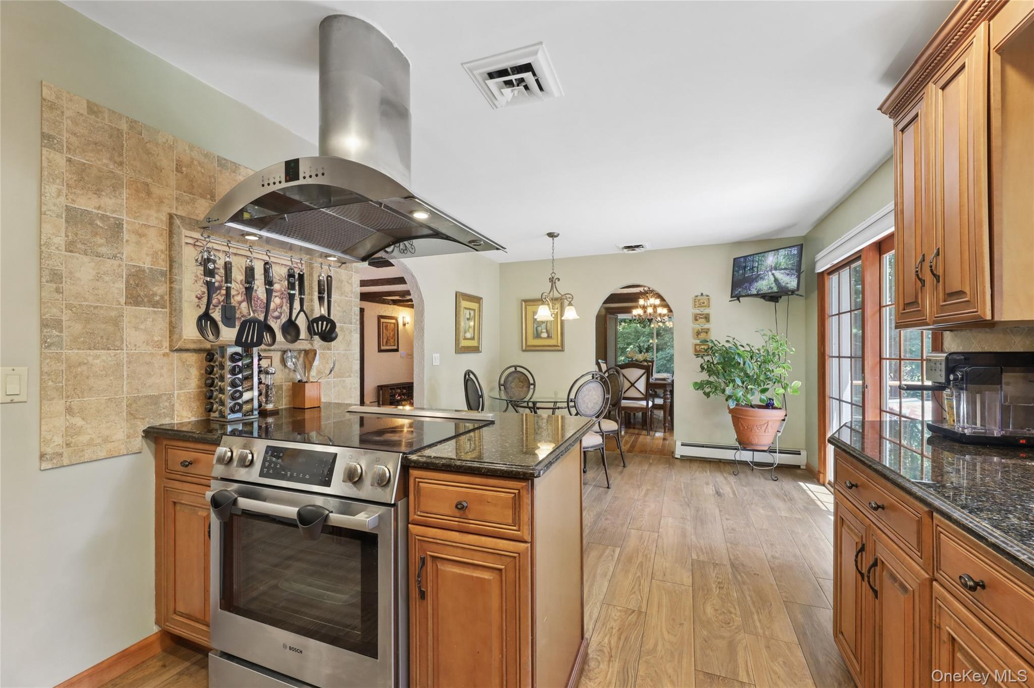 341 Call Hollow Road Stony Point, NY 10980 - Photo 12 of 46 island with electric range with exhaust hood.