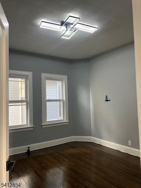 925 South Street Elizabeth, NJ 07202 - Photo 4 of 7 a view of empty room with wooden floor and fan