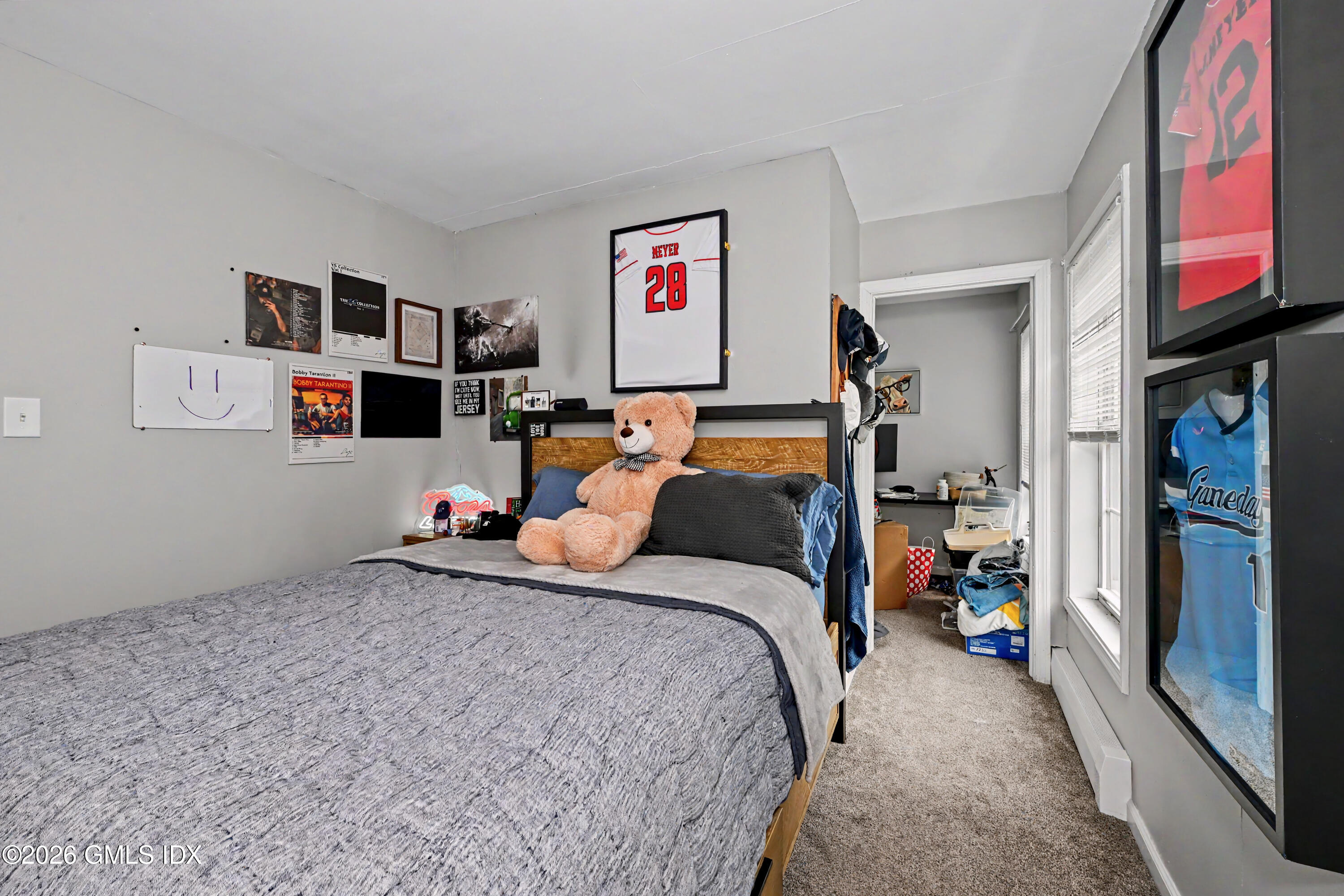 37 Prospect Street Greenwich, CT 06830 - Photo 12 of 41 a bed room with a bed and a desk
