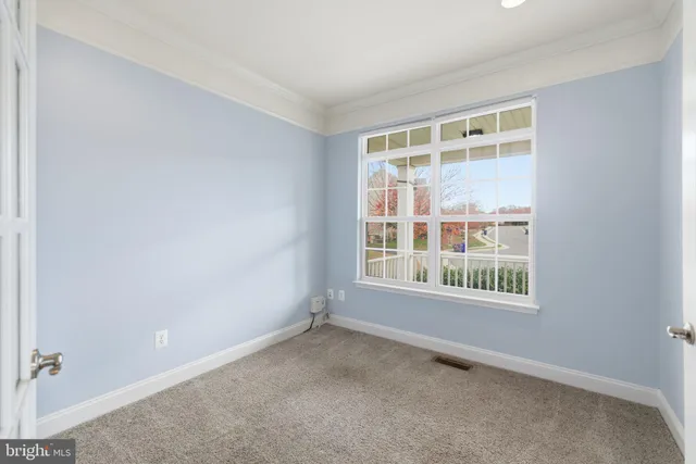 a bathroom with a sink toilet and a mirror