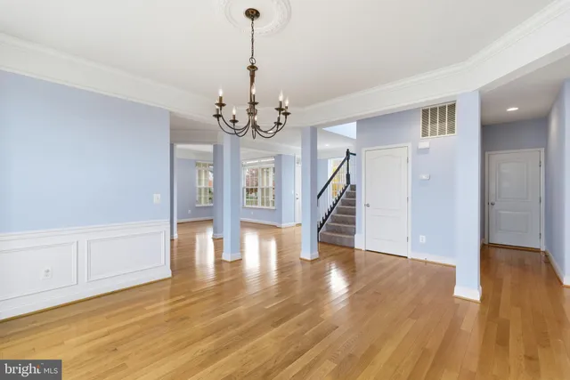 a view of an empty room with a fireplace