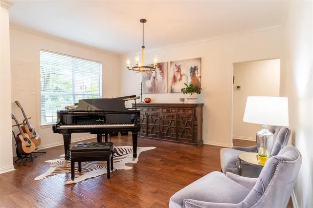 a workspace with furniture and a wooden floor