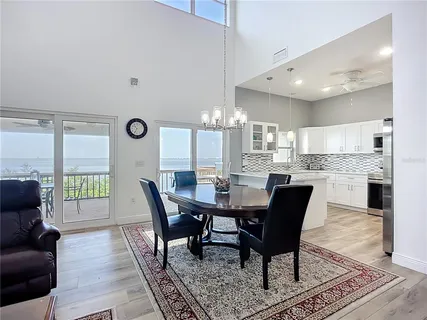 an aerial view of a house with outdoor space