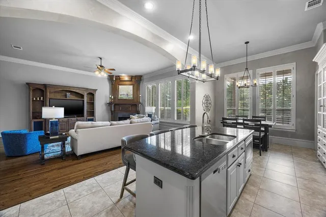 a kitchen with counter top space appliances and cabinets