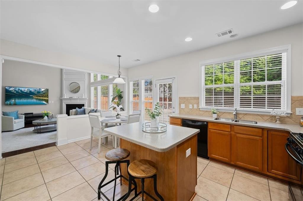 825 Poplar Terrace Canton, GA 30115 - Photo 12 of 46 a view of a dining room with furniture window and outside view