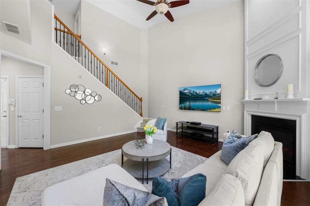 825 Poplar Terrace Canton, GA 30115 - Photo 19 of 46 a living room with furniture and a fireplace
