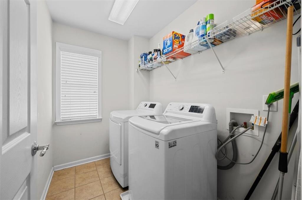 825 Poplar Terrace Canton, GA 30115 - Photo 32 of 46 a utility room with dryer and washer