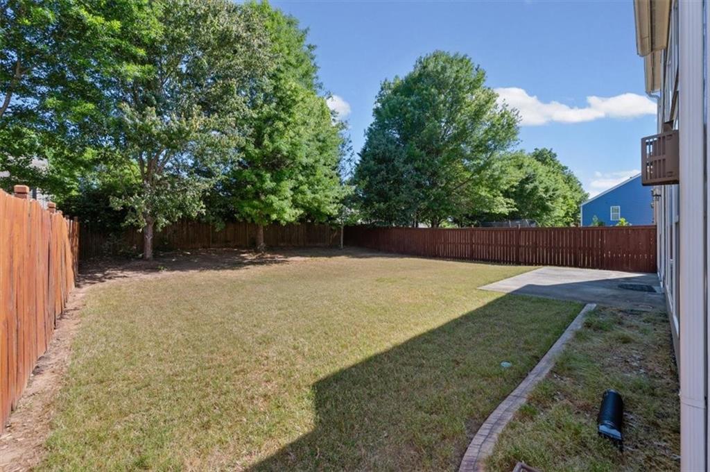 825 Poplar Terrace Canton, GA 30115 - Photo 34 of 46 a backyard of a house