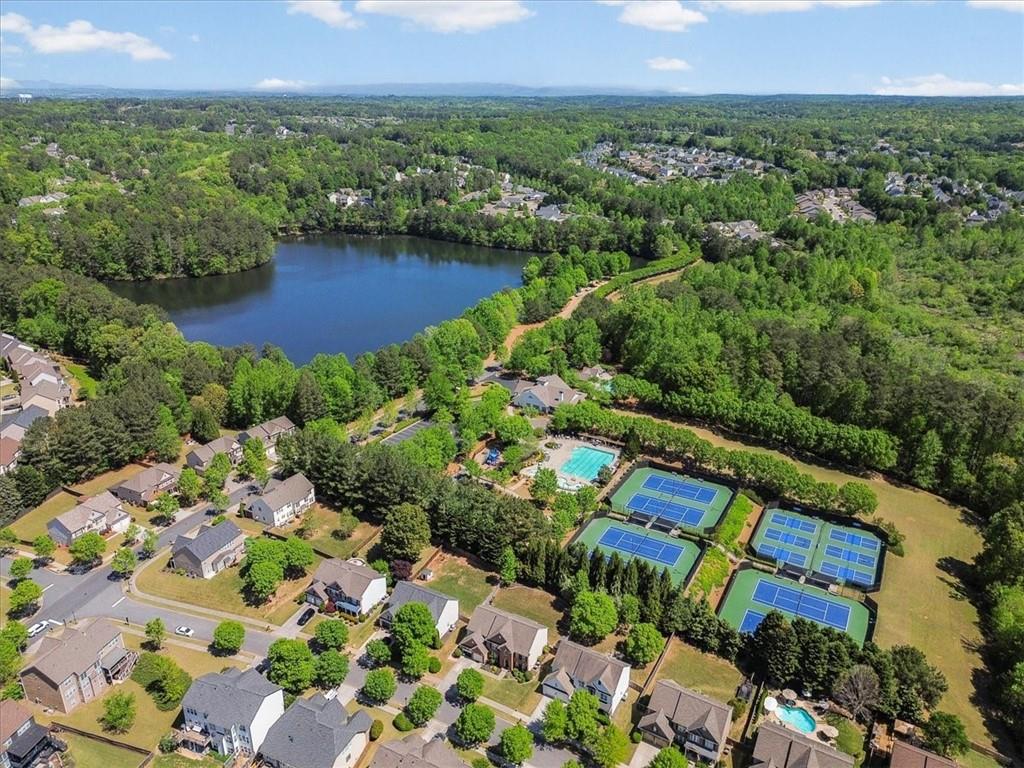 825 Poplar Terrace Canton, GA 30115 - Photo 44 of 46 an aerial view of a house with a garden and lake view