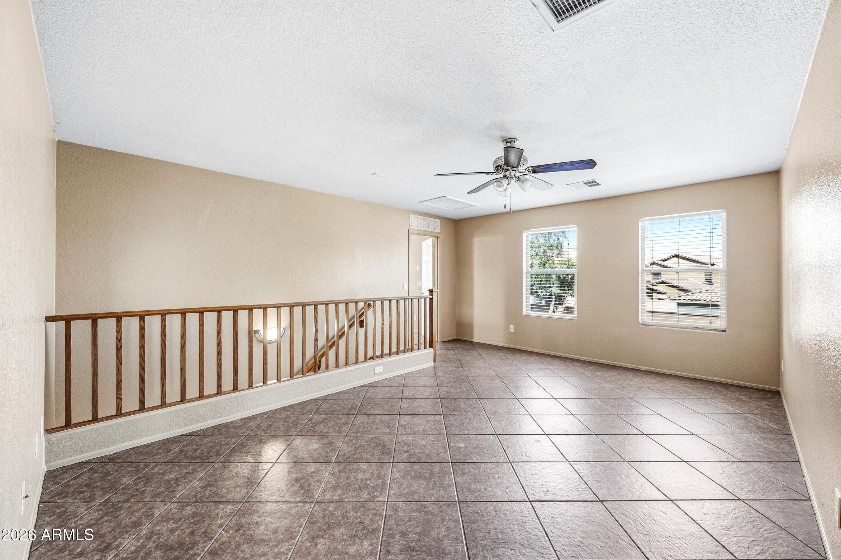 9515 West Monte Vista Road Phoenix, AZ 85037 - Photo 15 of 29 a view of an empty room with a window