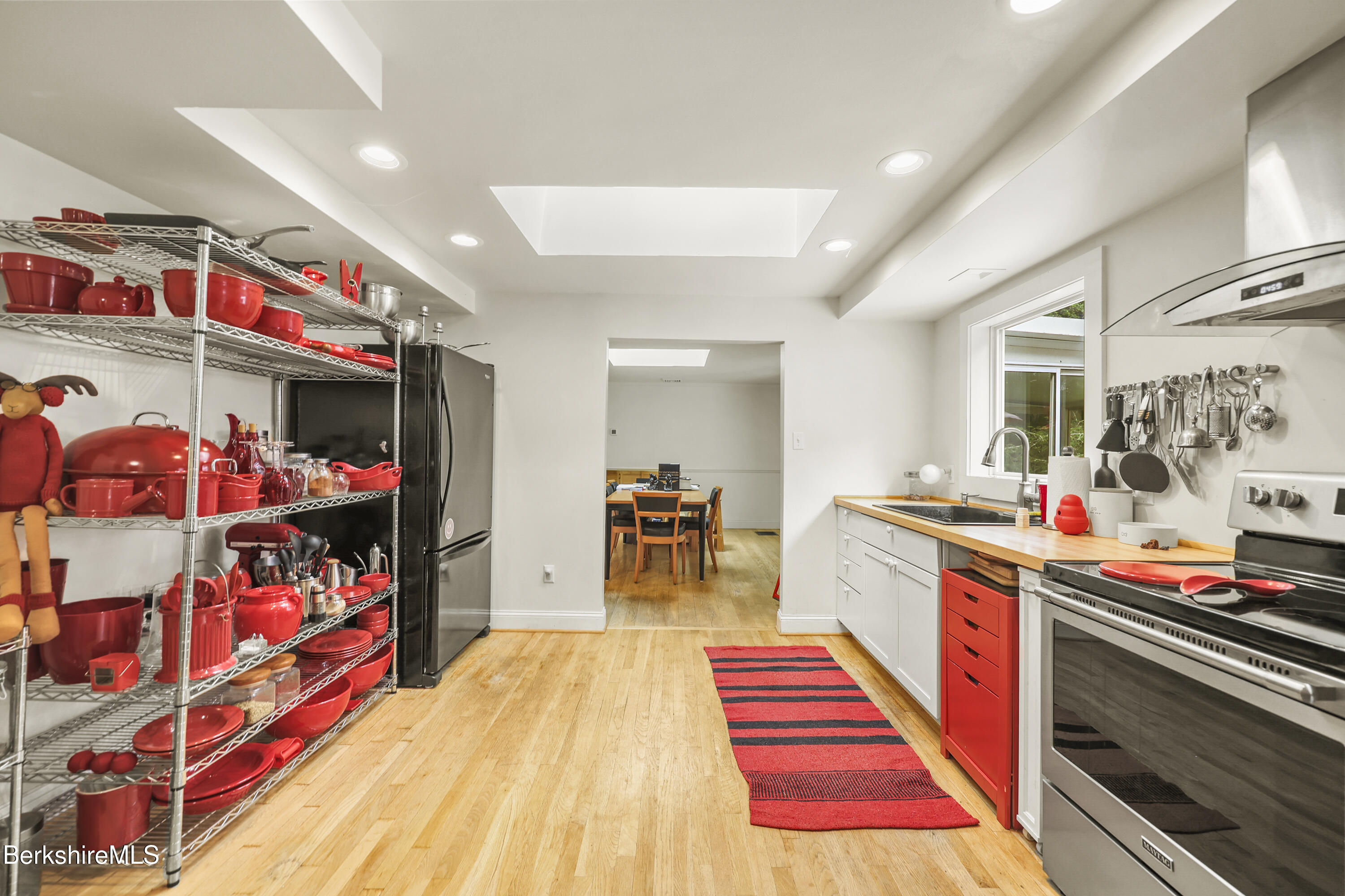 128 Rannapo Road Sheffield, MA 01257 - Photo 13 of 40 Kitchen to dining room
