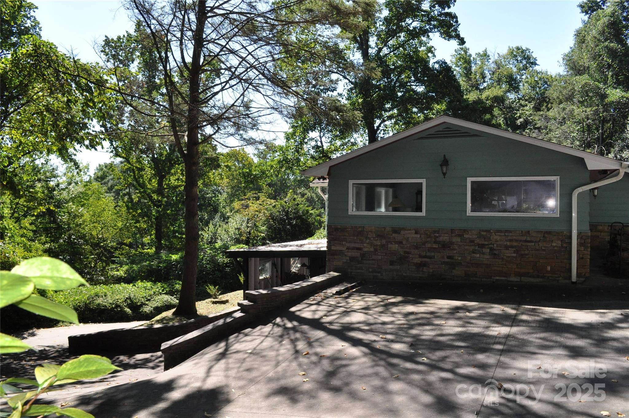 502 Meadowlark Drive Tryon, NC 28782 - Photo 11 of 40 a front view of a house with a yard