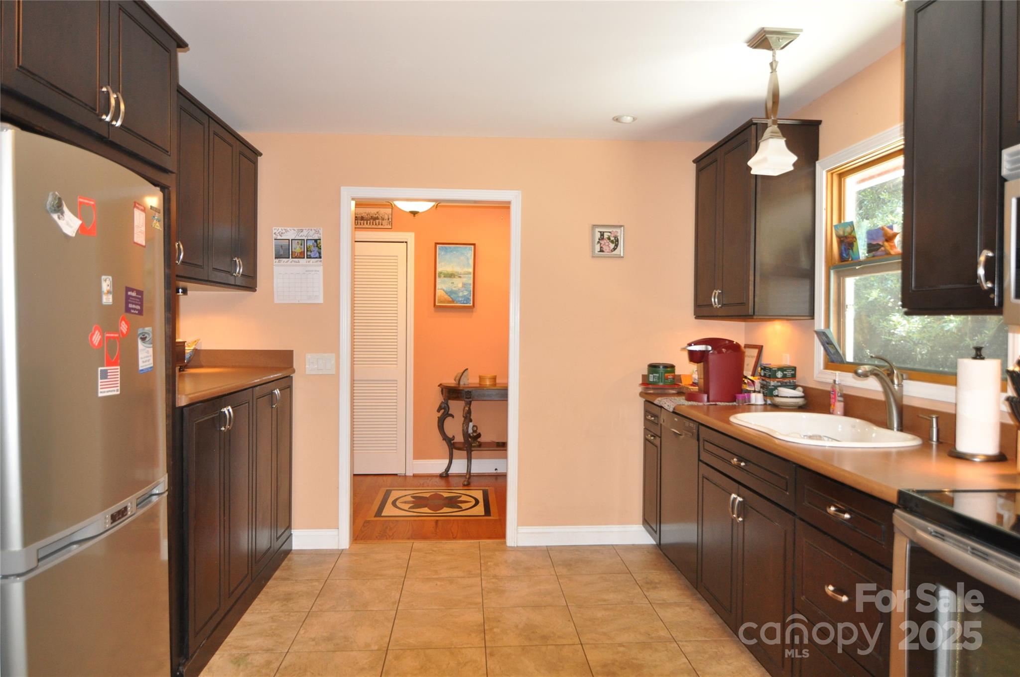 502 Meadowlark Drive Tryon, NC 28782 - Photo 19 of 40 a spacious bathroom with a sink a mirror and a shower