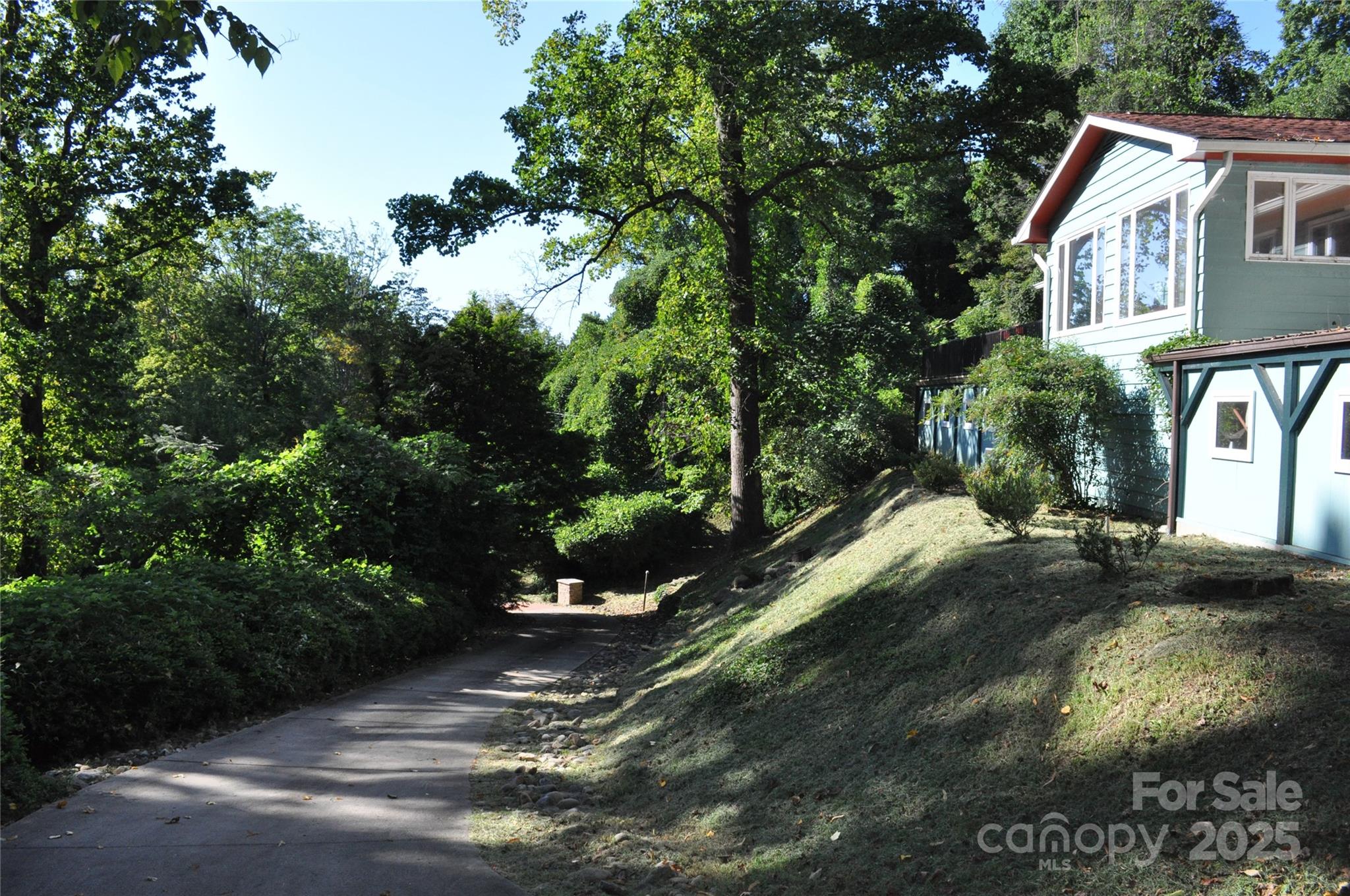502 Meadowlark Drive Tryon, NC 28782 - Photo 2 of 40 a view of a house with a yard