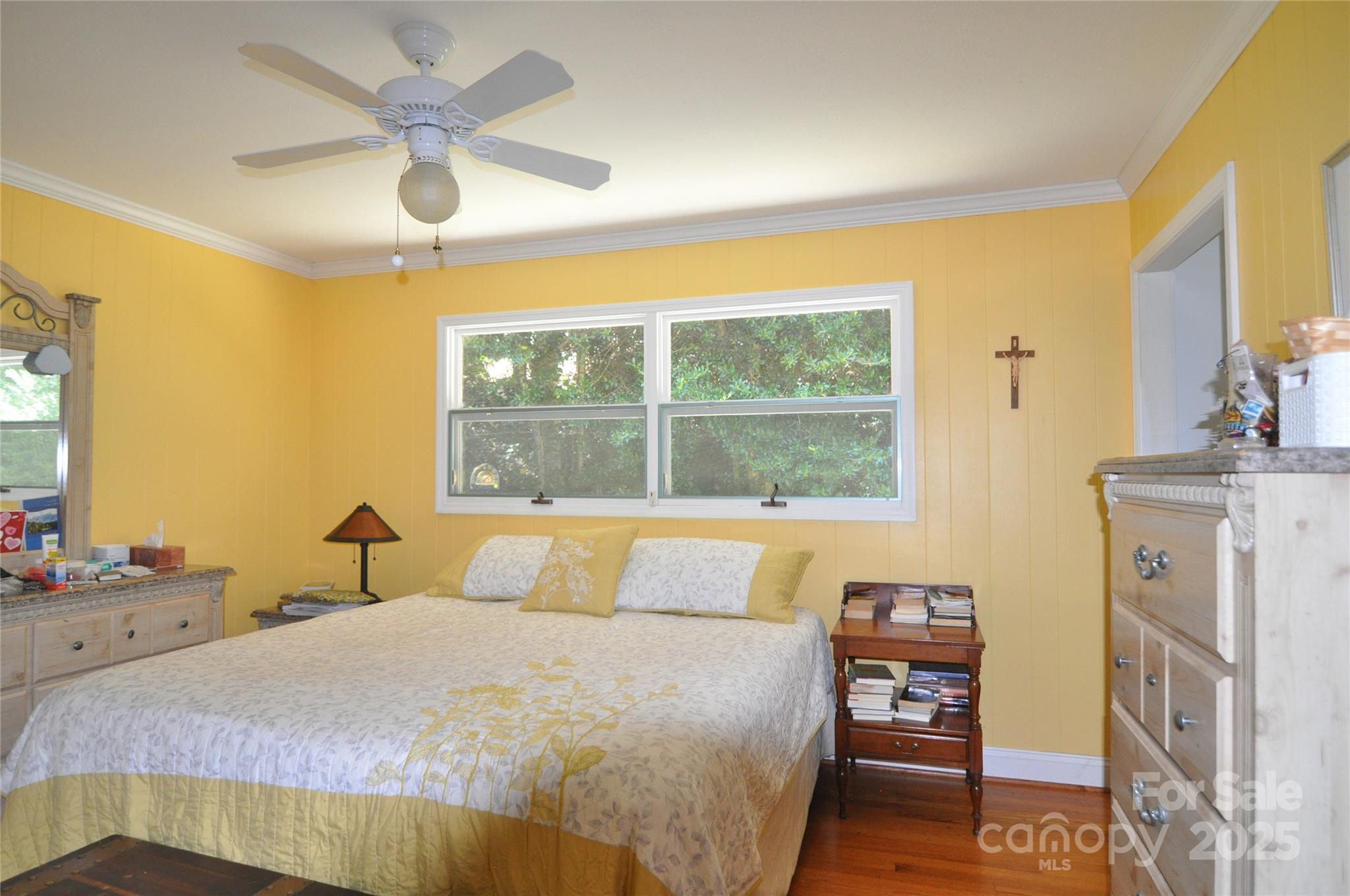 502 Meadowlark Drive Tryon, NC 28782 - Photo 25 of 40 a bedroom with a bed dresser and a window